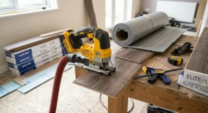 DIY tool setup featuring a cordless jigsaw alongside underlay and laminate flooring planks.
